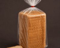 Wrapped Sliced Bread on Dark Brown Background (1)